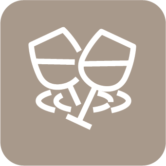 A light brown icon with an outline of two wine glass tossing.