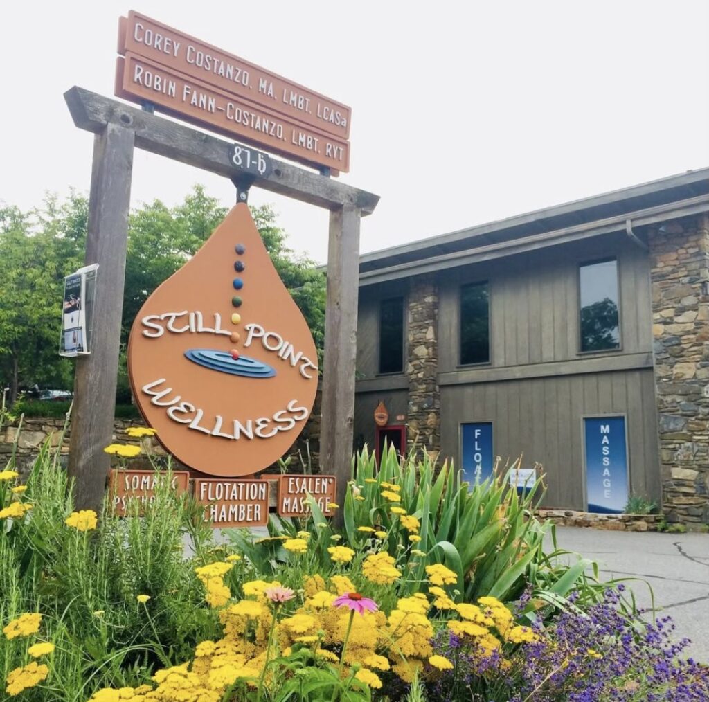 Signage and outside look at Still Point Wellness in Asheville